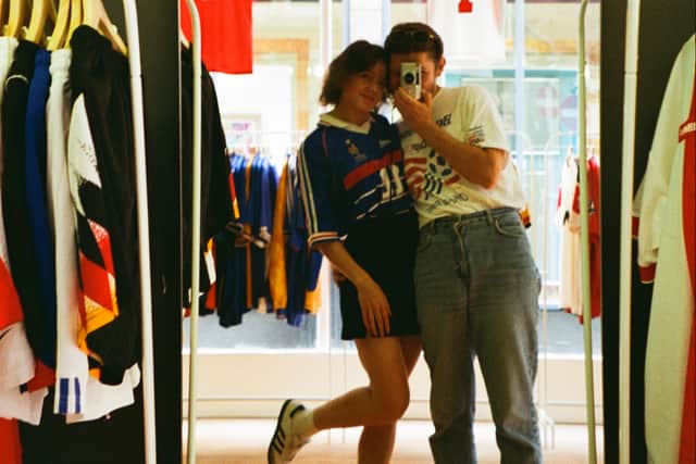 Manchester’s new vintage football shirt shop Stunner, owned by Ukrainians Serge and Polina (pictured).