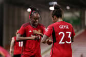 Melvine Malard celebrates her equaliser against Paris Saint-Germain with Geyse. Cr. Getty Images