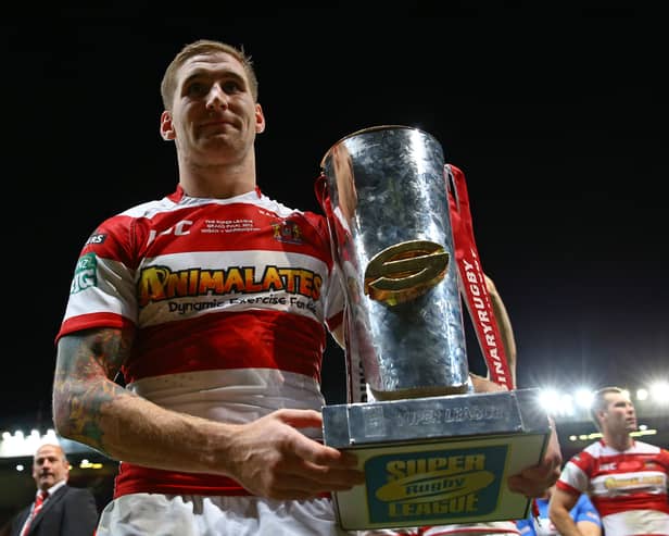 Sam Tomkins celebrates winning the Grand Final with Wigan back in 2013