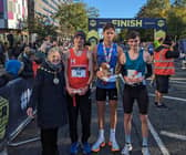 Jack Rowe celebrates victory in the Men's Elite race at this year's Manchester Half 