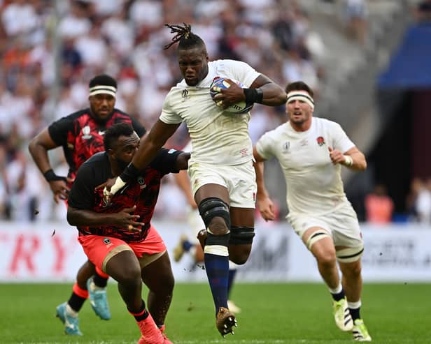 Maro Itoje of England breaks through the tackle of Luke Tagi of Fiji during the Rugby World Cup France 2023 Quarter Final match between England and Fiji at Stade Velodrome on October 15, 2023 in Marseille, France. (Photo by Dan Mullan/Getty Images)