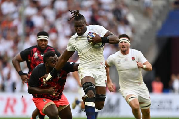Maro Itoje of England breaks through the tackle of Luke Tagi of Fiji during the Rugby World Cup France 2023 Quarter Final match between England and Fiji at Stade Velodrome on October 15, 2023 in Marseille, France. (Photo by Dan Mullan/Getty Images)