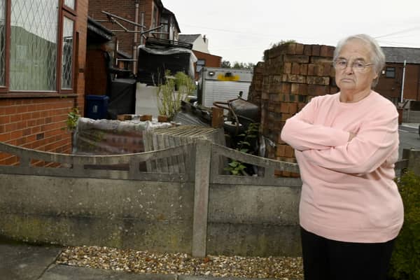 Margaret Fishwick lives next door to the house
