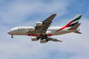 An Emirates Airlines Airbus A380 aircraft descends on its landing approach to Dubai International Airport in Dubai on April 17, 2023. (Photo by Giuseppe CACACE / AFP) (Photo by GIUSEPPE CACACE/AFP via Getty Images)