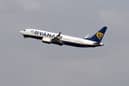 A Ryanair airplane takes off (Photo by HATIM KAGHAT/Belga/AFP via Getty Images)