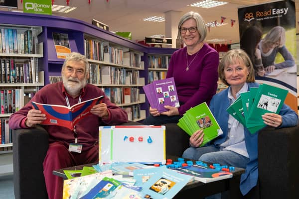 L-R Cllr John Taylor, one of the Manchester Airport Community Trust Fund trustees, with Fiona Clear and Marie Joyce of Read Easy Stockport