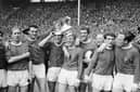 Sir Bobby Charlton, far left, celebrates winning the 1963 FA Cup with Manchester United 