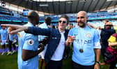 Noel Gallagher with Man City boss Pep Guardiola 