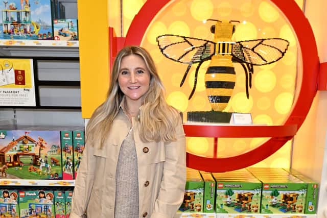Former Hollyoaks star Jazmine Franks with the Bee LEGO at the new Trafford Centre store 