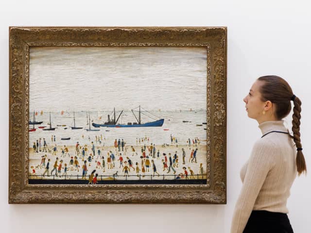  L.S. Lowry’s Beach Scene, Lancashire (estimated £1,000,000 – 1,500,000) goes on view at Sotheby's on November 17, 2023 in London, England.  (Photo by Tristan Fewings/Getty Images for Sotheby's)
