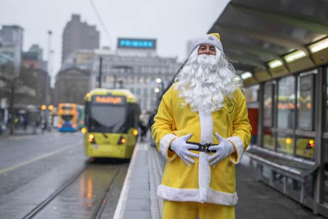 Santa Claus in his Bee Network inspired outfit 