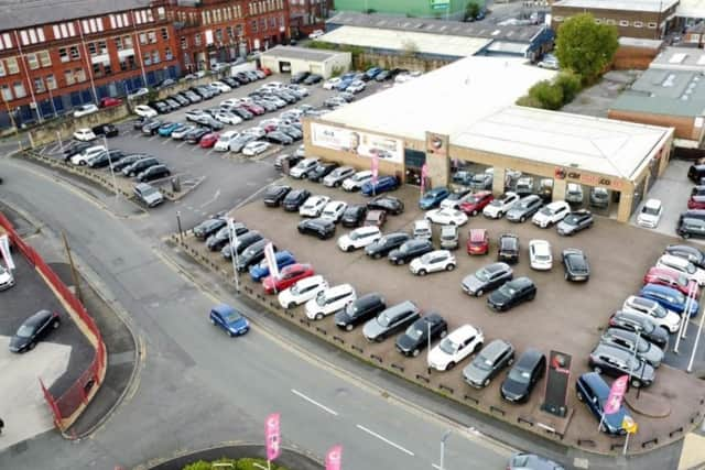 Plans have been submitted to demolish the Car Time show room and car park on Bell Lane to be replaced with a a petrol station and food outlets