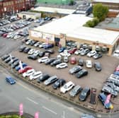 Plans have been submitted to demolish the Car Time show room and car park on Bell Lane to be replaced with a a petrol station and food outlets