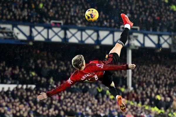 Alejandro Garnacho of Manchester United scores the team's first goal the Premier League match between Everton FC and Manchester United at Goodison Park on November 26, 2023 in Liverpool, England. (Photo by Shaun Botterill/Getty Images)