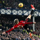 Alejandro Garnacho of Manchester United scores the team's first goal the Premier League match between Everton FC and Manchester United at Goodison Park on November 26, 2023 in Liverpool, England. (Photo by Shaun Botterill/Getty Images)