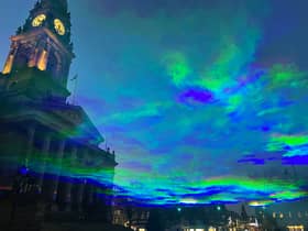 The 'northern lights' shine above Bolton town centre as part of the Put Big Light On festival