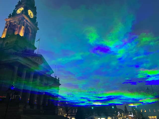The 'northern lights' shine above Bolton town centre as part of the Put Big Light On festival