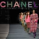 Few people had a Chanel fashion show taking over the Northern Quarter on their 2023 Manchester bingo card.