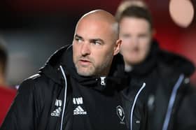 Former Manchester United Under-23s boss Neil Wood has been sacked as Salford boss.