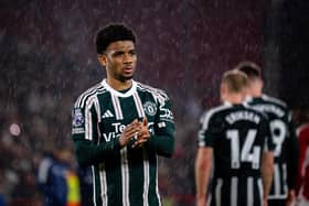Manchester United winger Amad Diallo salutes the Nottingham Forest fans after the defeat at the City Ground