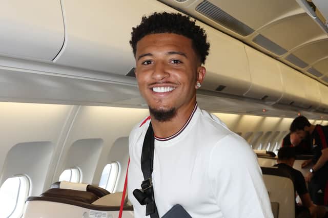 Jadon Sancho has completed his loan move back to Borussia Dortmund.