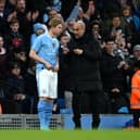 Pep Guardiola said he is delighted to have Kevin De Bruyne back as Manchester City beat Huddersfield Town.