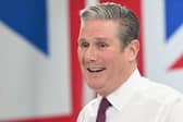 Britain's main opposition Labour Party leader Keir Starmer smiles as he delivers a speech at the National Composites Centre at the Bristol and Bath Science Park in Bristol, south-west England on January 4,