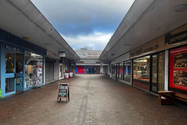 Chorlton Cross shopping precinct is preparing to close down. Only a handful of shops remain open. 