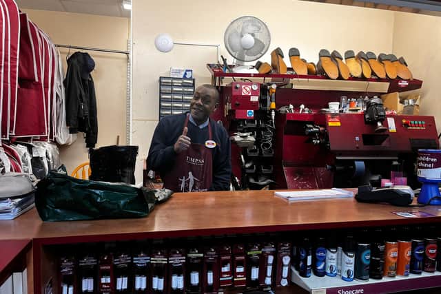 Rory at Timpsons in Chorlton Precinct, which is closing down ahead of demolition. 