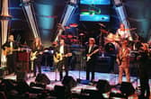 The Eagles (from left:) Randy Meisner, Timothy Schmit, Glenn Frey, Don Felder, Joe Walsh, Don Henley and Bernie Leadon, appear together on stage 