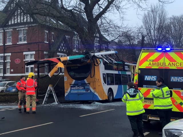 A double-decker bus lost its roof in Chorlton on Friday morning - in a collision with a tree.