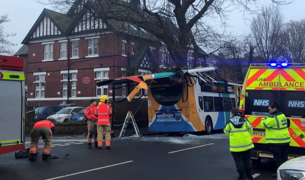 A double-decker bus lost its roof in Chorlton on Friday morning - in a collision with a tree.