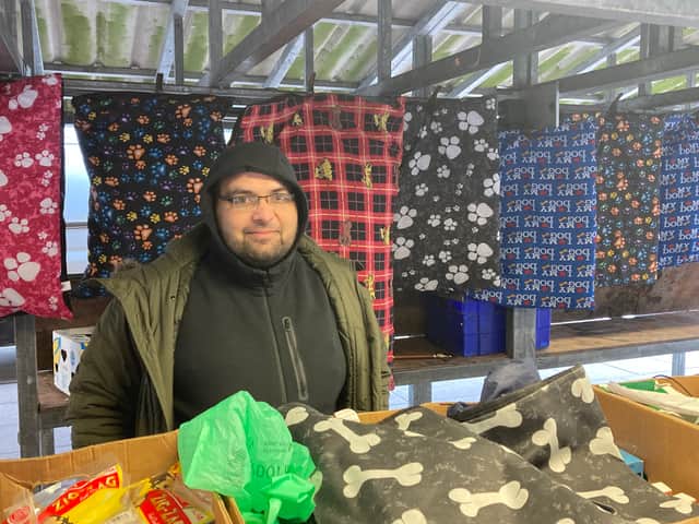 Umair Hussain has been trading at Hyde market for 16 years. He has had to expand his range as other traders at the market drop out. Credit: George Lythgoe/LDRS