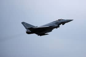 An RAF Typhoon jet takes off 