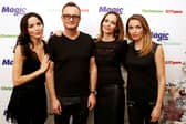 Andrea Corr, Jim Corr, Sharon Corr and Caroline Corr of The Corrs backstage at Magic Radios festive concert The Magic of Christmas at London Palladium on November 29, 2015 in London, England. (Photo by John Phillips/Getty Images)