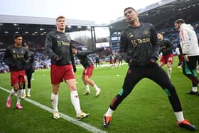 Man Utd players warming up in kit from the Stone Roses collaboration