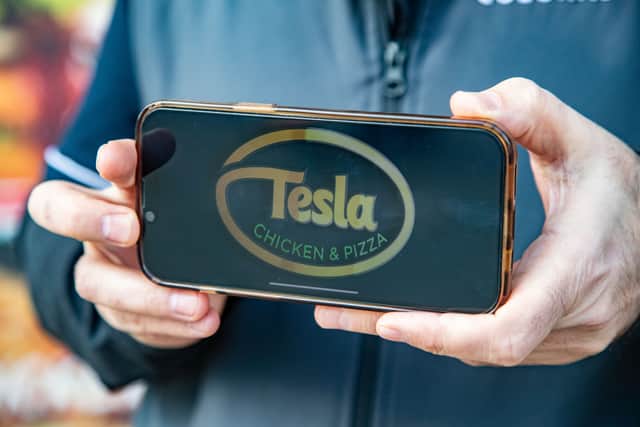 The Tesla logo for the proposed new shop. Picture: SWNS