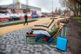 Oliver from Stretford enjoying the view of busy traffic from the new sunloungers