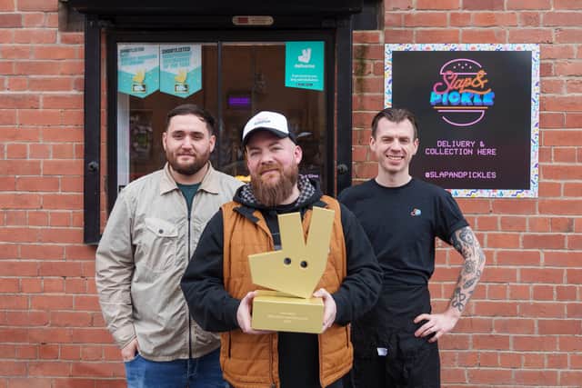 Head of people, Simon Barnes (centre) with Jack Charlesworth (left) and JB (right) at Slap & Pickle in Sheffield. Picture: Dominic Lipinski/PA Wire