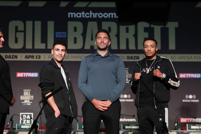 Zelfa Barrett, right, faces off with opponent Jordan Gill under the watchful eye of promoter Eddie Hearn at New Century Hall. Picture: Mark Robinson/Matchroom Boxing