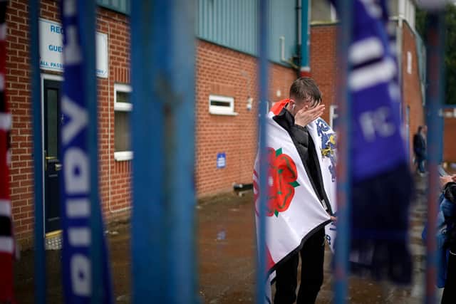 A heartbroken Bury fan as the club learned they were expelled from the EFL in 2019. 
