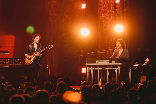 Neal Schon of Journey and Gregg Rolie perform during Journey's 50th Anniversary Tour at Moody Center on February 22, 2023 in Austin, Texas