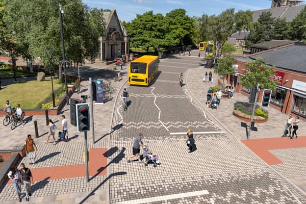 CGI showing proposed improved crossing, pavements and bus route in Heywood town centre