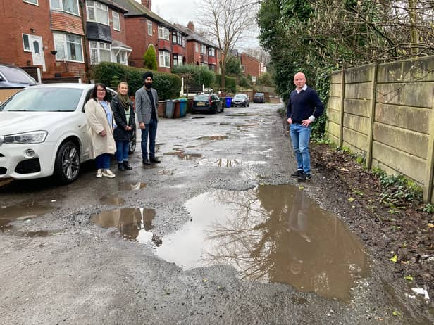 Local residents Kathryn, Tracey, Jaz, and David Hopes are fed up with the potholes.