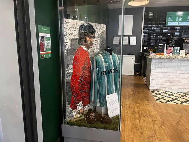 George Best by Mark Kennedy is on display at the National Football Museum, alongside a pair of his boots and the shirt worn at his testimonial match in 1988. It is part of the Irish Nation mosaic art trail, on display at venues across the city centre from 1-31 March, 2024. 
