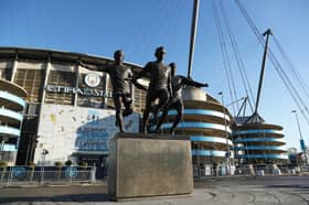 The statues of Colin Bell, Francis Lee and Mike Summerbee outside the Etihad Stadium