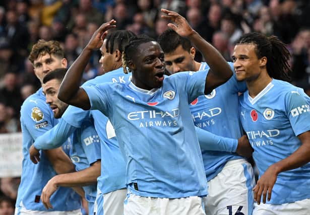 Jeremy Doku missed Manchester City training on Tuesday with mild discomfort.