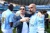 Noel Gallagher with Manchester City boss Pep Guardiola. 