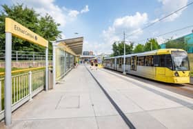 A Metrolink tram at the Etihad Campus stop