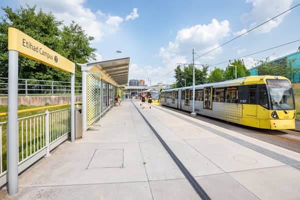 A Metrolink tram at the Etihad Campus stop